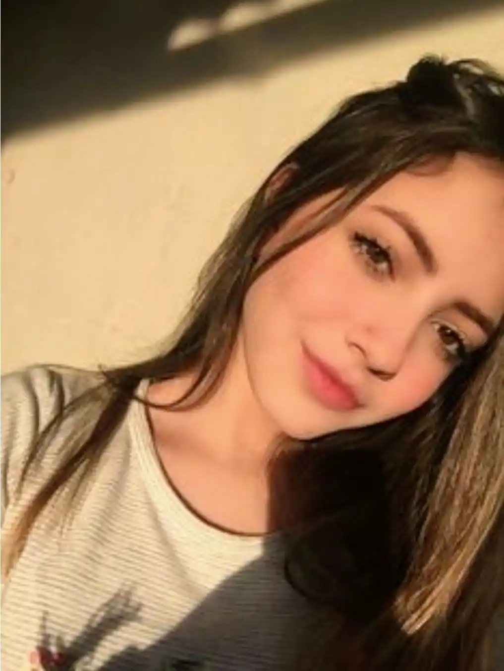 Golden Hour Autumn Wedding Portrait: A Romantic Couple in a Park with Bouquets and Falling Leaves